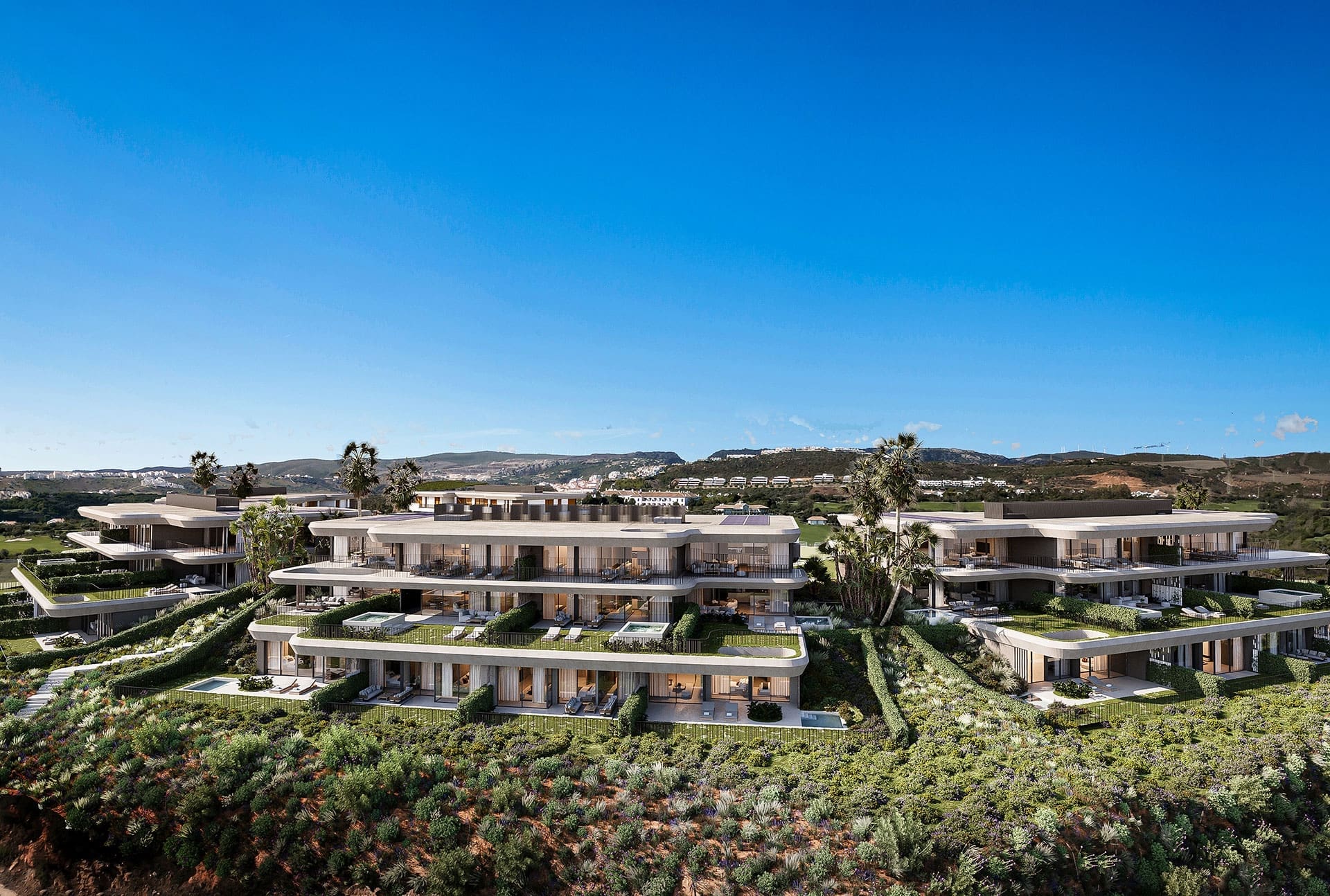 Moderne woningen van Nalu Suites in Casares Costa, gepresenteerd door MDR Luxury Homes, met een architectuur die harmonieert met de natuur en luxe leefruimtes biedt