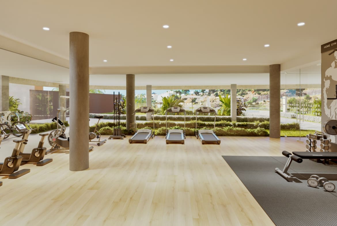 Korall Residences door MDR Luxury Homes in Fuengirola met luxe design en zeezicht Gym Korall Residences by MDR Luxury Homes in Fuengirola with luxury design and sea views.