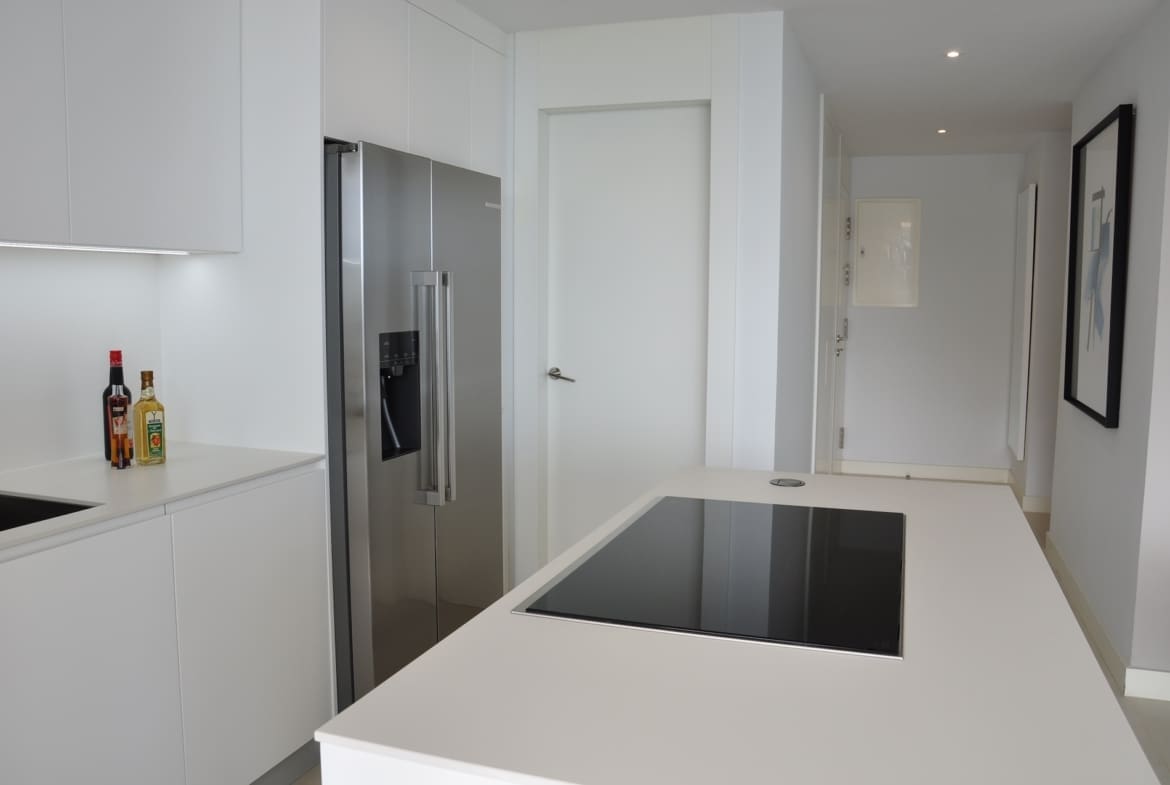 Move-in ready luxury apartment in Higuerón West with sea views and high-end finishes. For sale with MDR Luxury Homes.