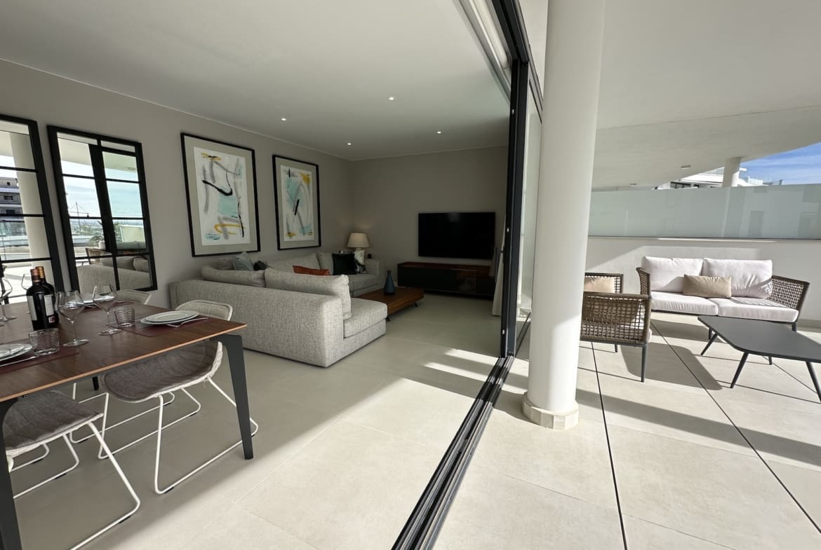 Move-in ready luxury apartment in Higuerón West with sea views and high-end finishes. For sale with MDR Luxury Homes.