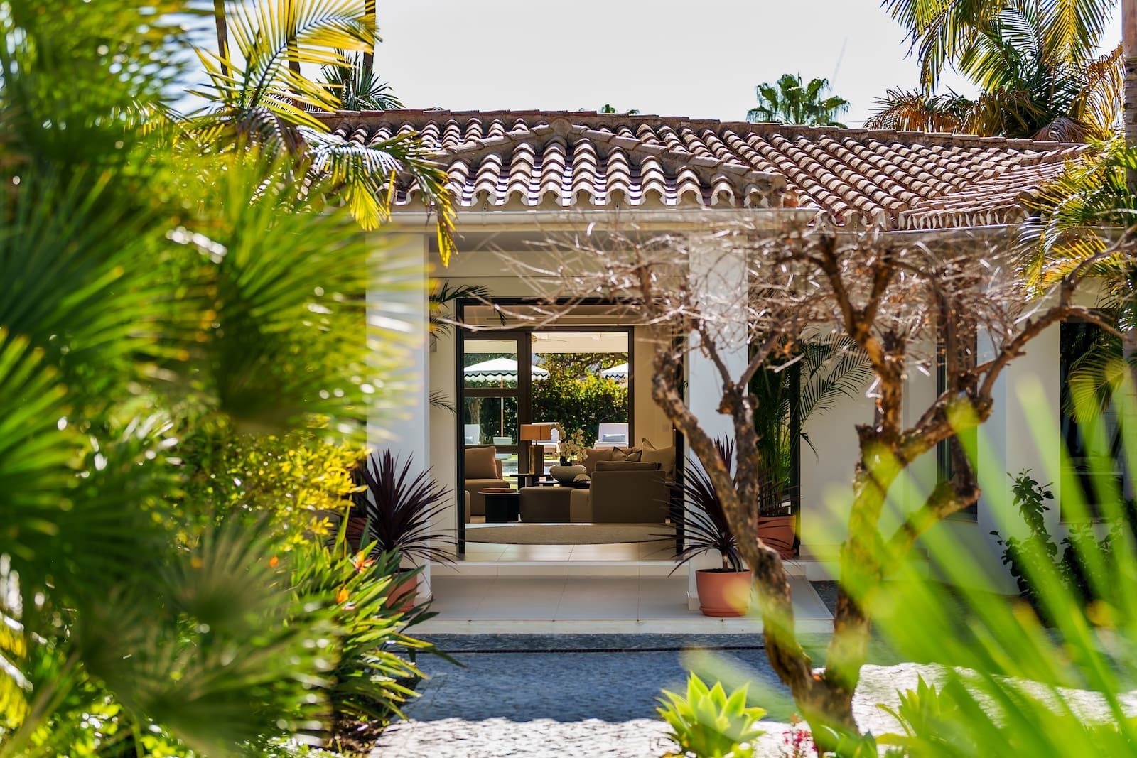 Villa Palm Springs in La Cerquilla, Marbella – luxury bungalow with botanical gardens and pool, listed by MDR Luxury Homes.