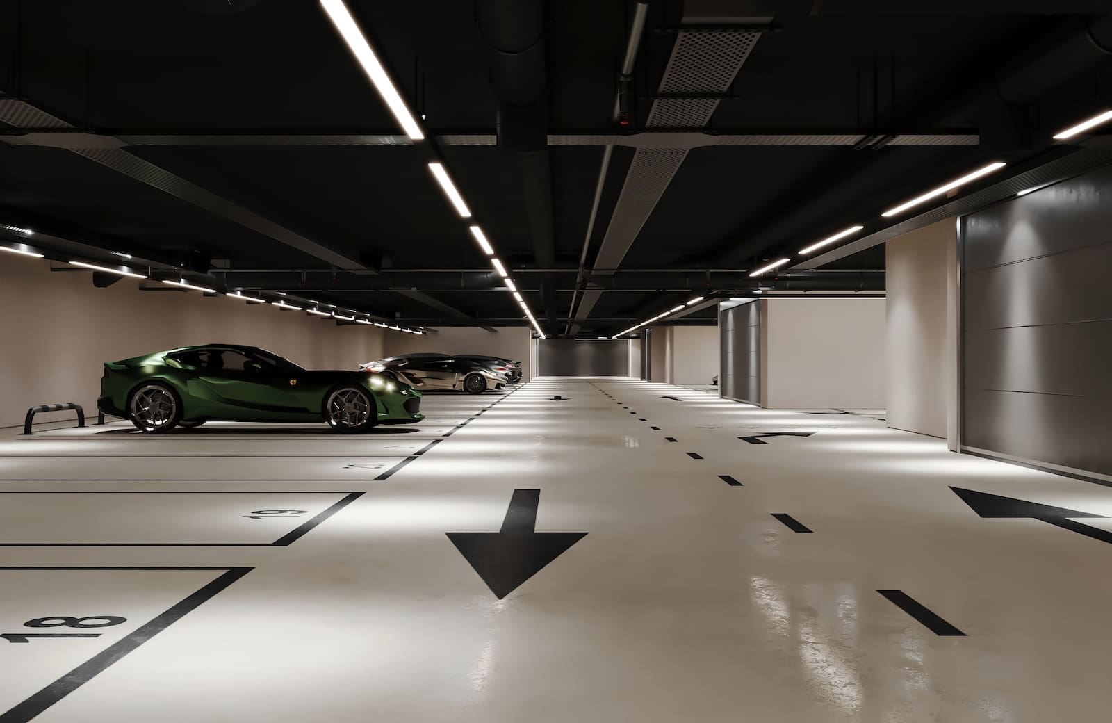 Green sports car parked in a modern underground parking garage with bright overhead lights on the left side